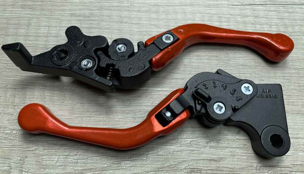 MANETE MINI ESPORT REG DOBRAVEL CG125/CG150 LARANJA NEON PAR (FREIO DISCO)